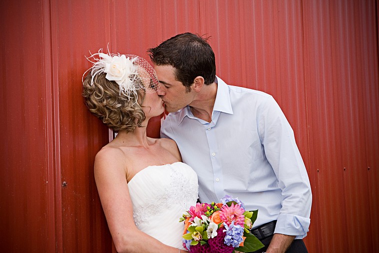 bride and groom kissing in wedding. Wedding picture of bride & groom in vancouver bc. picture compliments of Audra's Photography.